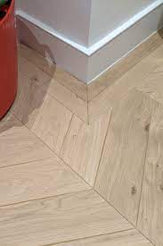 Distinctive Wide Angled Oak Chevron Parquet Replica In West Hampstead Playroom Nw6 In 2021 Chevron Pattern Floor Chevron Floor Natural Wood Flooring