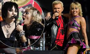 The pregame festivities will be on location for the 7,500 vaccinated health care workers that will be in attendance for the part of cyrus' performance will also be shown on the cbs super bowl lv pregame show. Miley Cyrus Is Joined On Stage By Icons Billy Idol And Joan Jett During Tiktok Tailgate Pregame Show Daily Mail Online