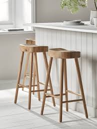 Plan seating around your kitchen island to suit your family, the number of people in your household, and your decorating and entertaining style. Weathered Oak Counter Stool