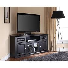 Black Finished Corner Tv Cabinet Idea A Floor Light Fixture With Tall Legs And Black Lampshade Corner Tv Stands Corner Tv Corner Entertainment Center