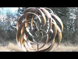 These Spinners Are Set In Motion By The Wind And Will Keep Your Guests Dazzled With The Changing Patterns They Make As T Wind Art Wind Sculptures Wind Spinners