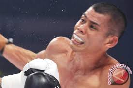 Chris John hadapi Billy Dib di Singapura