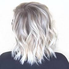 This look features long and curly brown hair with added ashy and blonde tones. 47 Unforgettable Ash Blonde Hairstyles To Inspire You