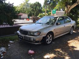 Kereta buruk dalam semak samun. Myaduan Mbi