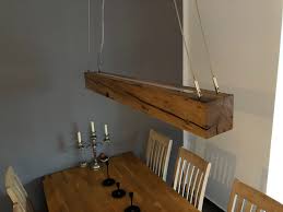 Hangelampe Aus Fachwer Eiche Unten Sind Drei Spots Intergiert Oben Findet Sich Ein Diffuses Leuchtelement Was Den Raum U Lampen Hange Lampe Und Eiche