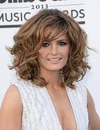 Stana Katic Medium Curls With Bangs Big Curly Hair Hair Styles Medium Hair Styles