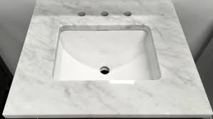 Marble countertops have a reputation for being one of the most beautiful kitchen and bathroom surfaces, however, they cultured marble countertops aren't carved out of natural stone. Italian Carrara 8 Drill Cultured Marble Vanity Top The Flooring Factory