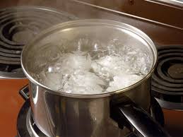 Place a Wooden Spoon Across a Bubbling Pot to Stop Water From Boiling Over
