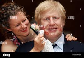 Madame tussauds colouring manager zoe walton with the waxwork of boris  johnson. the mayor of london