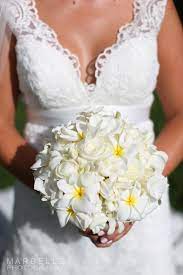 You could make this plumeria paper bouquet with my free template and step by step tutorial. Tropical Bouquets Lois Hiranaga Floral Design Maui Hawaii