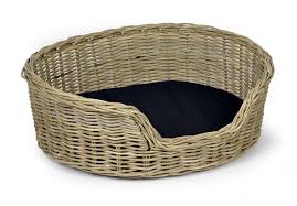 A wicker dog bed can be a stylish sleeping spot for your pup. Woofers Wicker Dog Bed Basket Round Dog Nappers Dog Beds