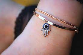 Maybe you would like to learn more about one of these? Explore The Hamsa Hand Meaning And How To Wear Hamsa Jewelry