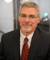 John E. Hannum, Partner