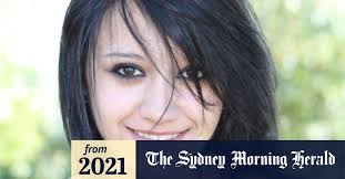 Small child seen 'cuddling' woman as she lay dead