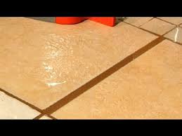 Scrub the sponge in a circular motion as it'll remove any stains. How To Remove Mildew Stains From Bathroom Tiles Ceramic Tile Repair Youtube