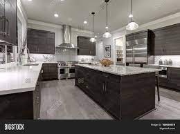 An open kitchen layout that flows from multiple rooms such as the dining area to the living room can be ideal. Modern Open Plan Gray Image Photo Free Trial Bigstock