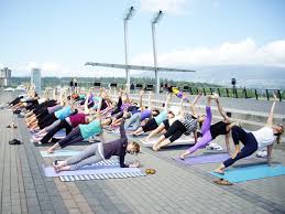 From hot yoga to ysculpt, you can enjoy a variety of heated and non heated yoga and fitness class styles with one membership. Lululemon Free Nooner Summer Yoga Class Vancouver Olympic Cauldron Insiya Rasiwala Finn 2 Good Old Lululemon Blog
