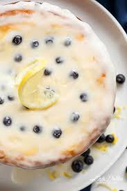 There's something dreamy about this cheesecake combine cream cheese with eggs, more lemon zest, lemon juice and sugar. Blueberry Lemon Cheesecake Cake Cafe Delites