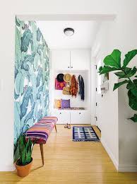 A visual texture like this hexagonal wallpaper contrasts well with the natural wooden element of the buffet table. 12 Gorgeous Bohemian Entryway Decor Ideas