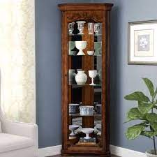 Rated 2 out of 5 by keep it from bad didn't like it look cheap and was not made right had to send it back. Erastus Lighted Corner Curio Cabinet Corner Curio Curio Cabinet Decor Curio Cabinet