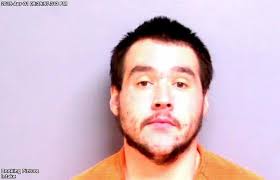 Brothers charged with assaulting an officer