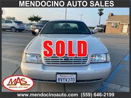Image result for Light Ice Blue 2002 Crown Victoria
