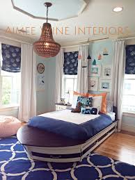 Nautical Boys Room Boat Bed Navy Orange Aqua And Rope Accents Kids Bedroom Design Bedroom Design Coastal Room