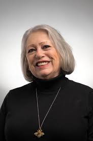 Joan "Joni" Vicente, Real Estate Agent