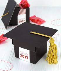We Re Crushing On Grad Cap Favor Boxes Plus A Free Downloadable Crafted For You Graduation Party Favors Graduation Party Graduation Cap Favors