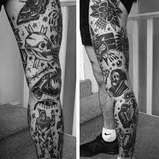 American Traditional Tattoo Sleeve Black And Grey You Should Experience Traditional Tattoo Leg Sleeve At Least Once In Your L Traditional Tattoo Sleeve Traditional Tattoo Leg Sleeve American Traditional Tattoo