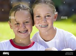 Twins girl 13 hi-res stock photography and images