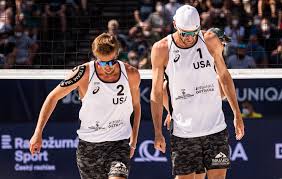 2.43m for men and 2.24m for women. Jake Gibb S Olympic Beach Volleyball Partner Taylor Crabb Reportedly Tests Positive For Covid 19