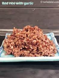 A thick mixture of vegetables like drumsticks, potatoes and carrots are cooked in coconut oil and mustard seeds. 3 Red Rice Recipes Tarladalal Com