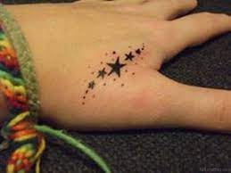 4.2 engrave a captivating om hamsa hand art. 29 Star Tattoos On Hand