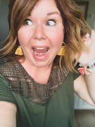 Walmart sweatshirt and local boutique earrings