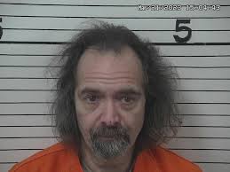 Multiple charged in Jackson County after human remains found burnt