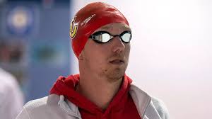 Dinos hold lead after medal haul