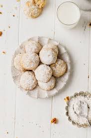 In a large bowl cream the powdered sugar and butter together, then add the 2 egg yolks, mix well. Walnut Snowball Cookies Cooking Lsl