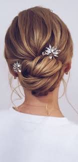 The height at the crown provides a welcomed balance to the overall look. Updo Hairstyles For Your Stylish Looks In 2021 Twisted Low Bun