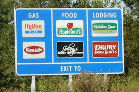 Split gas-food-lodging sign on I-35 | Blue logo signs with m… | Flickr