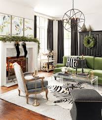An accent wall made of dark charcoal tiles boldly stands out in this elegant mill valley living room. Holiday Color Trend Black White And Green How To Decorate