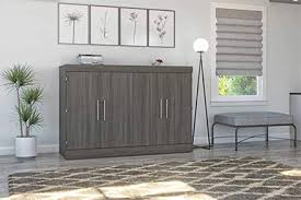 The maplewood shaker style doors and drawer fronts contrast nicely with the charcoal painted uppers in the kitchen area. The Murphy Bed What Why And How Innovatus Design