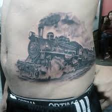 Moving Train Tattoos For Guys On Rib Cage Side Train Tattoo Tattoos For Guys Ribcage Tattoo