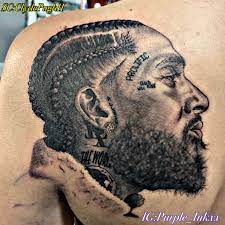 Ermias davidson asghedom , professionell bekannt als nipsey hussle , war ein amerikanischer nun, wenn wir zurückblicken zu seinem tattoo sieht es so aus, als ob seine tattoos etwas sagen. Nipsey Hussle Tattoo Tattoo Artists Tattoos Black And Grey Tattoos