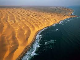 See roaring and fossilised dunes, ancient lava flows, the hoarusib castles of clay and the saltpans near the agate mountain. A Desert That Meets The Sea Of Aliens And Other Key Facts About Africa S Namib Desert Times Of India Travel