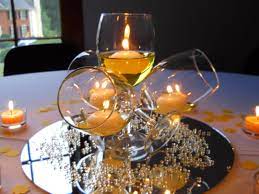 The metal fixture leading to the detailed wooden handle is elegantly curved for style. 50 And Fabulous Surprise Party Decor Yellow Centerpieces Glass Centerpieces Party Centerpieces