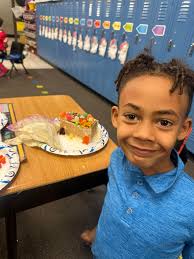 Mrs. Merrell's 1st Grade Class had SOO much fun making Gingerbread Houses!  They made some in small groups that they couldn't eat, but later made  individual ones that they enjoyed! 😋