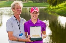 Charley Hull and her father Dave with ...