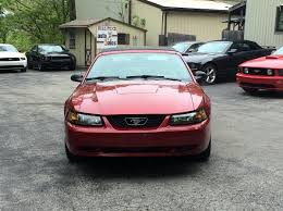 This carruns and drives great and is low mileage 116k miles! 2003 Red Ford Mustang Convertible