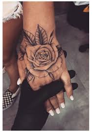 55 Beautiful Rose Tattoo Ideas Simple Tattoos For Women Rose Simpletattoosforwomenrose The Ro In 2021 Rose Tattoos For Women Rose Hand Tattoo Simple Hand Tattoos